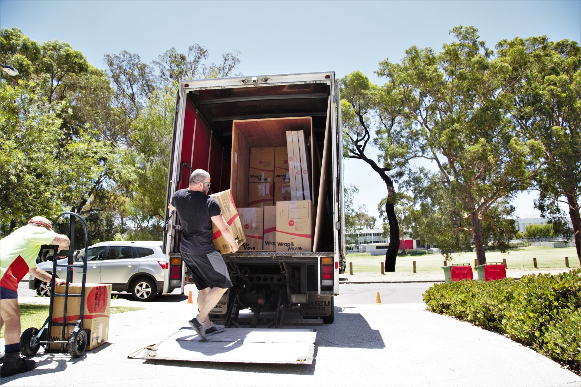 Moving van being loaded with boxes